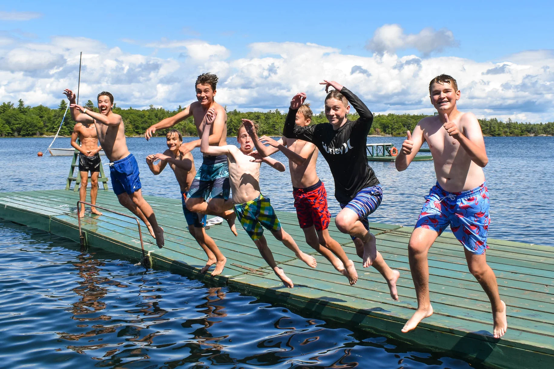 Boys leaping off the dock at Hurontario